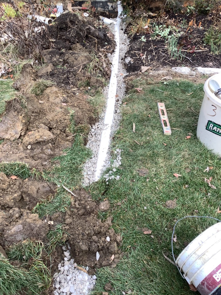 Yard with a newly installed drain.